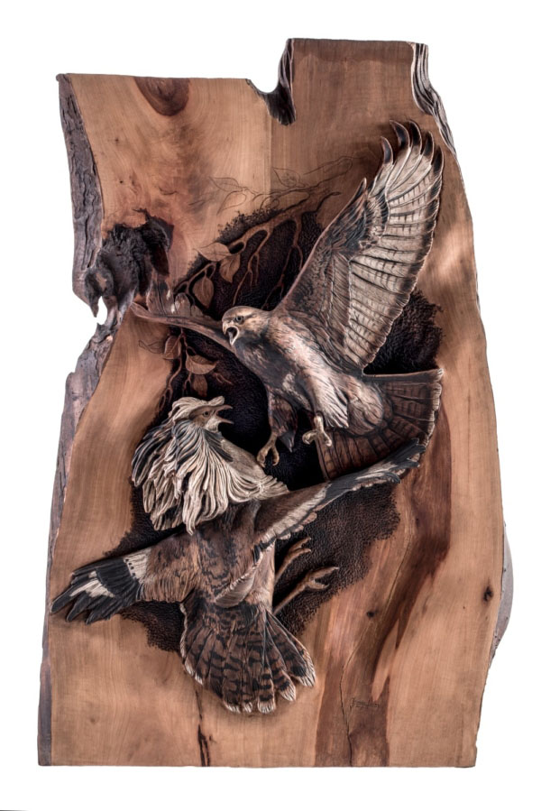 Wood carving hunting Falcon on Bustard (medium)